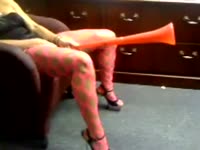 Slut using a gigantic dildo in her pussy